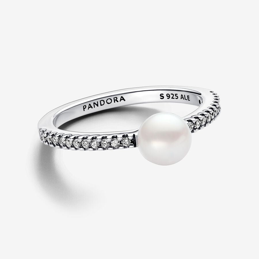 Sterling silver ring with white treated freshwater cultured pearl and clear cubic zirconia