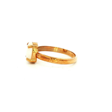 Solid Oval White Opal Ring in Yellow Gold