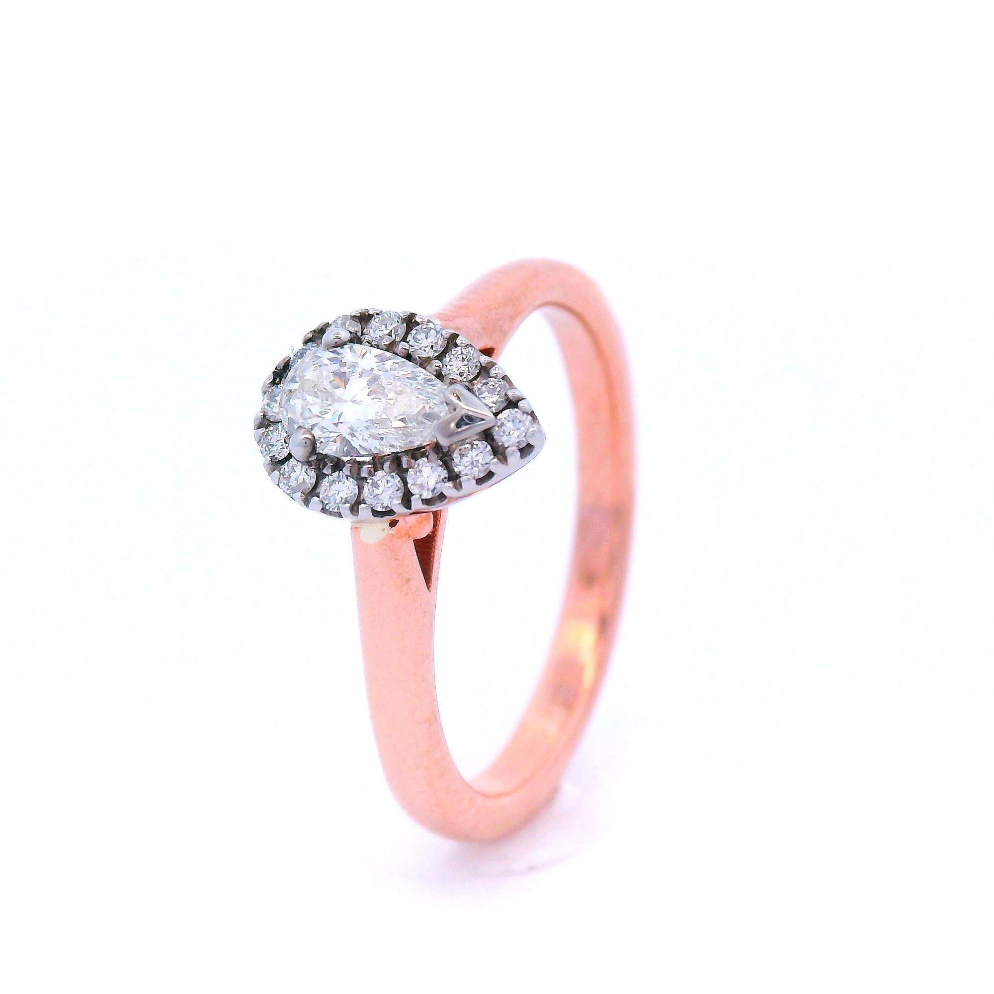 Halo Set Pear Shaped Diamond Engagement Ring set in Rose Gold