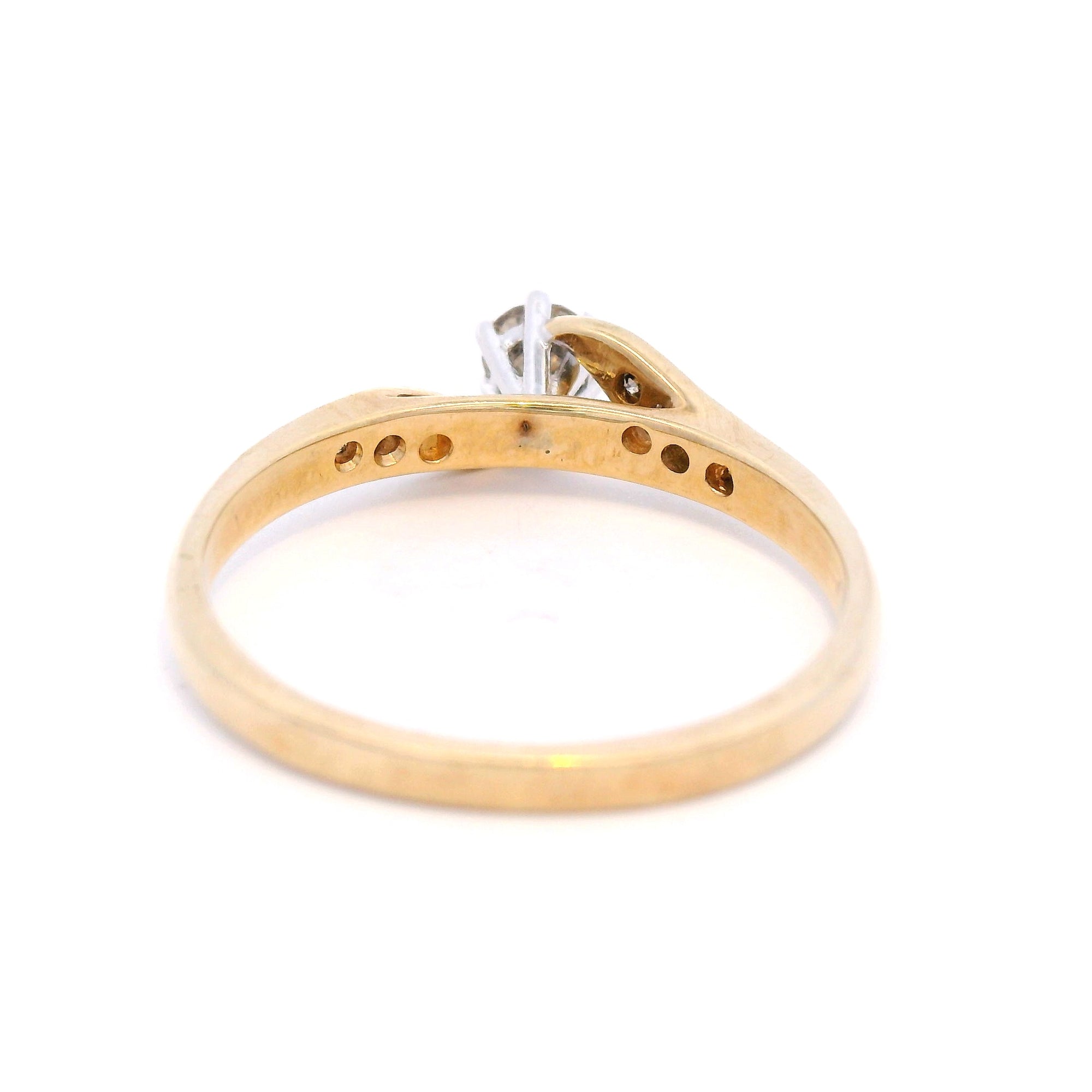 Diamond Halo Ring in Yellow Gold