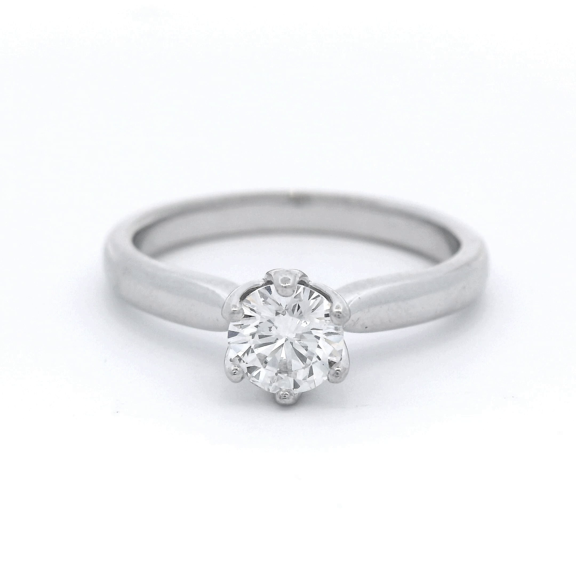 0.60 Carat Mined Round Brilliant Cut Solitaire Diamond Ring