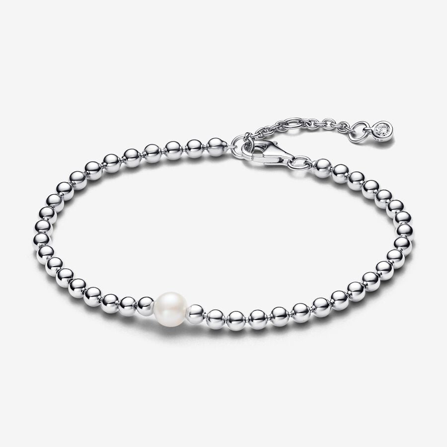 Beaded sterling silver bracelet with white treated freshwater cultured pearl and clear cubic zirconia