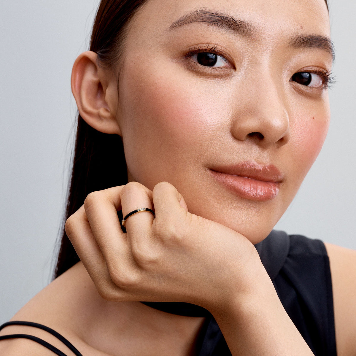 14k Gold-plated ring with clear cubic zirconia and black enamel