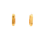 Oval Shape Huggie Earrings in Yellow Gold