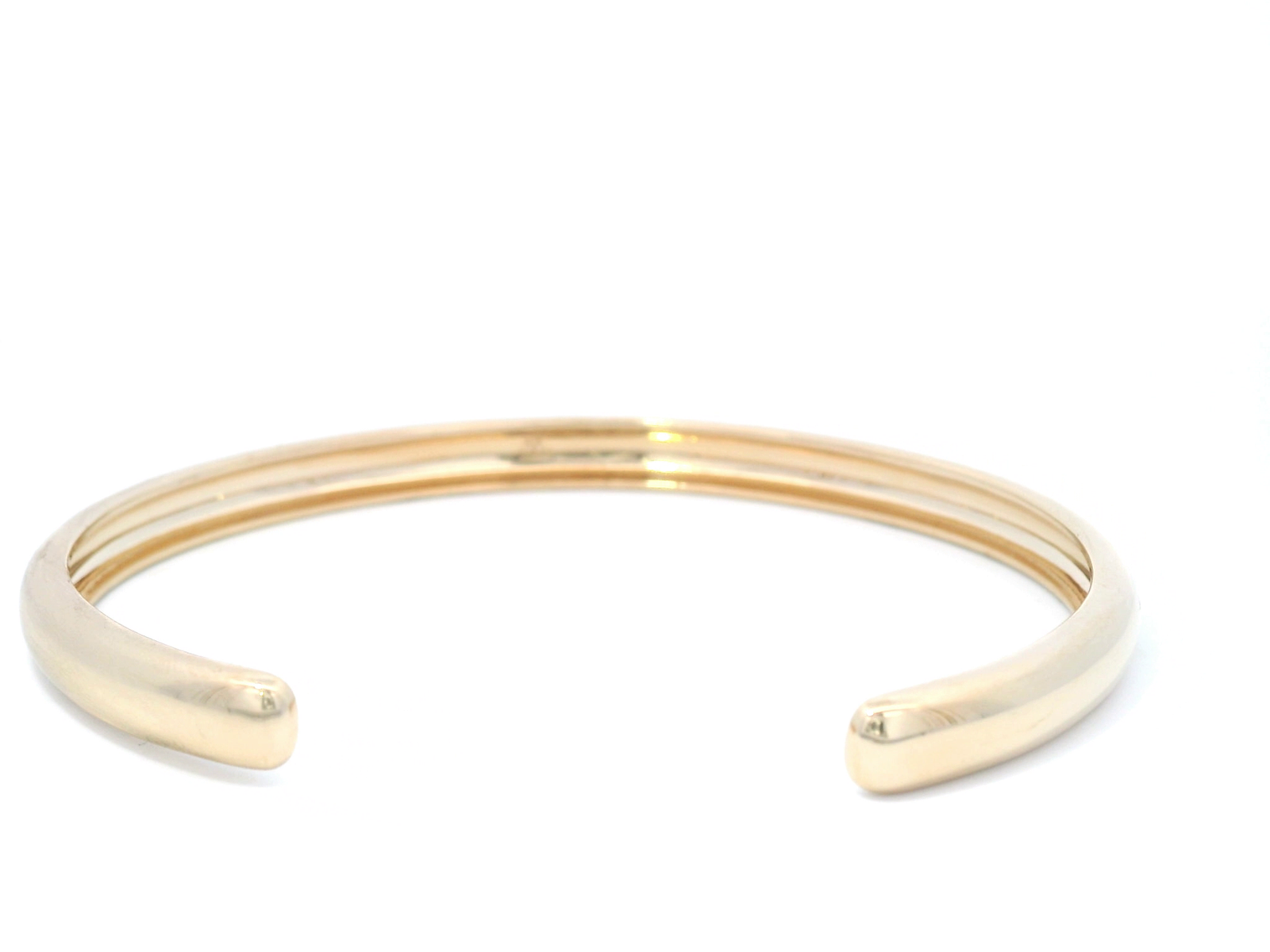 Hollow Bangle In Yellow Gold
