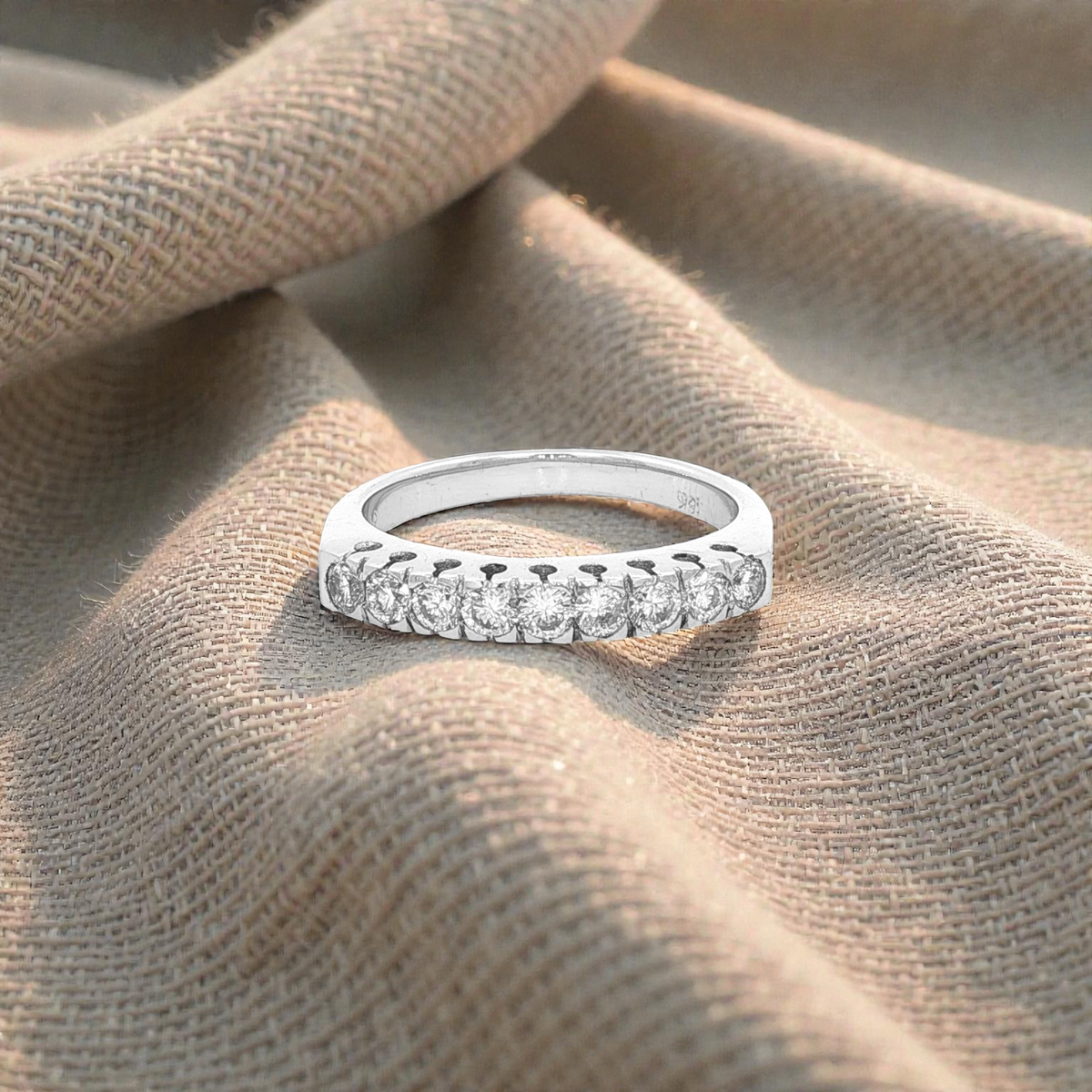 18 CARAT WHITE GOLD 9 STONE =.50CTDIA SZ M