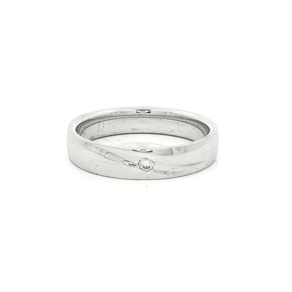 Platinum Band Ring with Round Brilliant Cut Diamond in White Gold