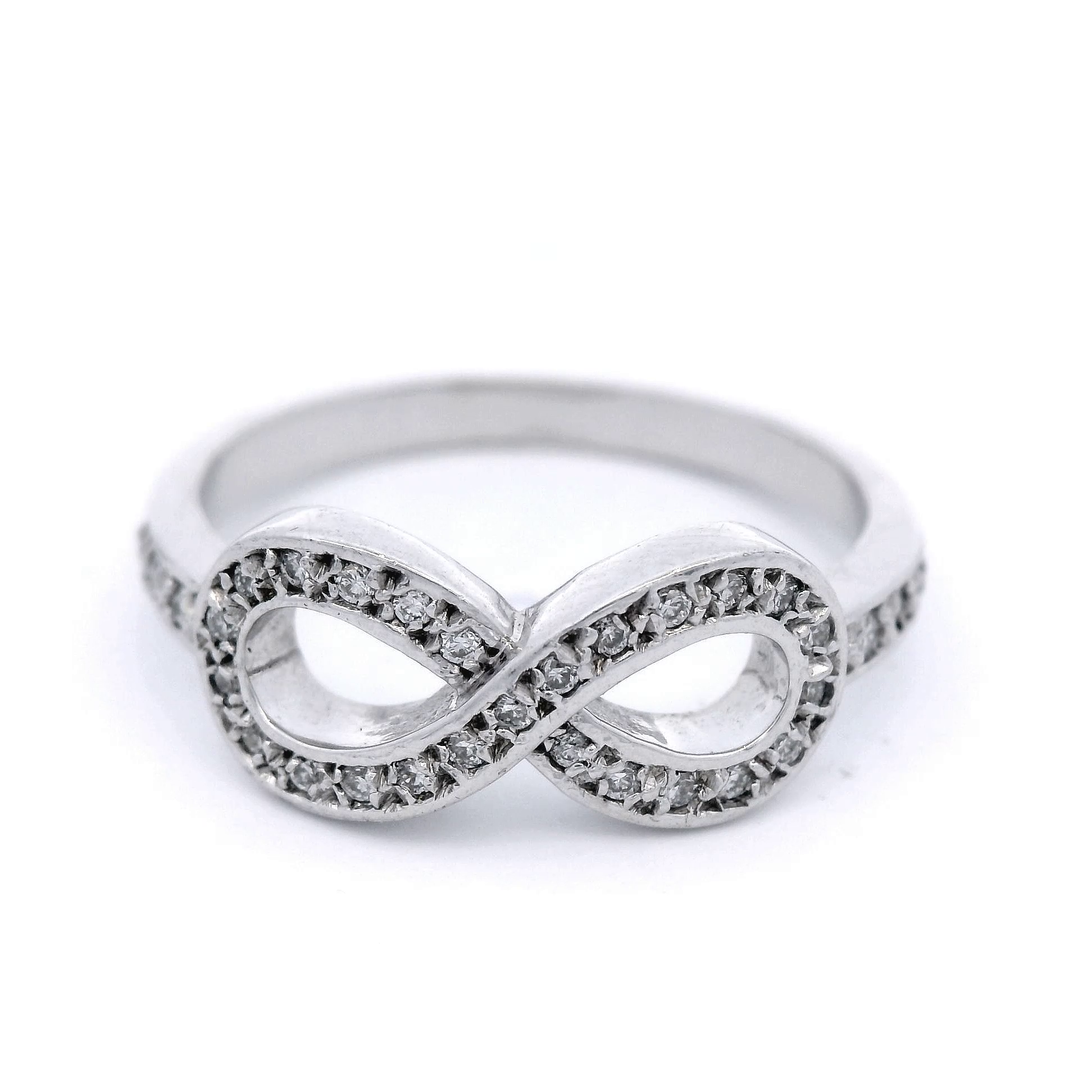 Diamond Set Infinity Ring in White Gold