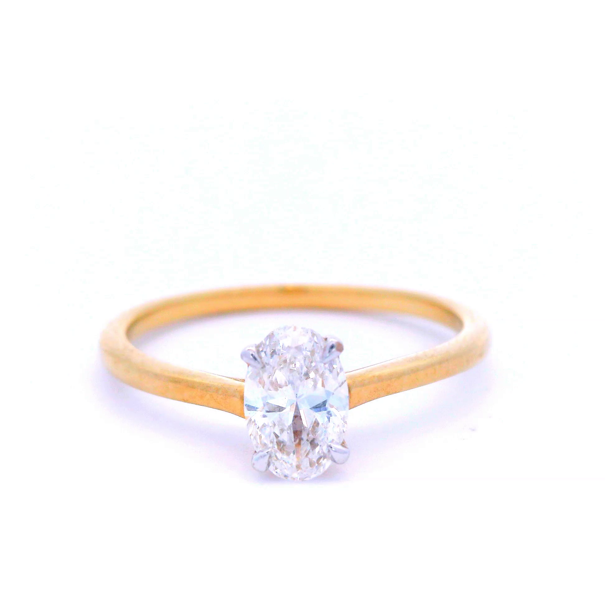 Oval Cut Diamond Set in Yellow Gold