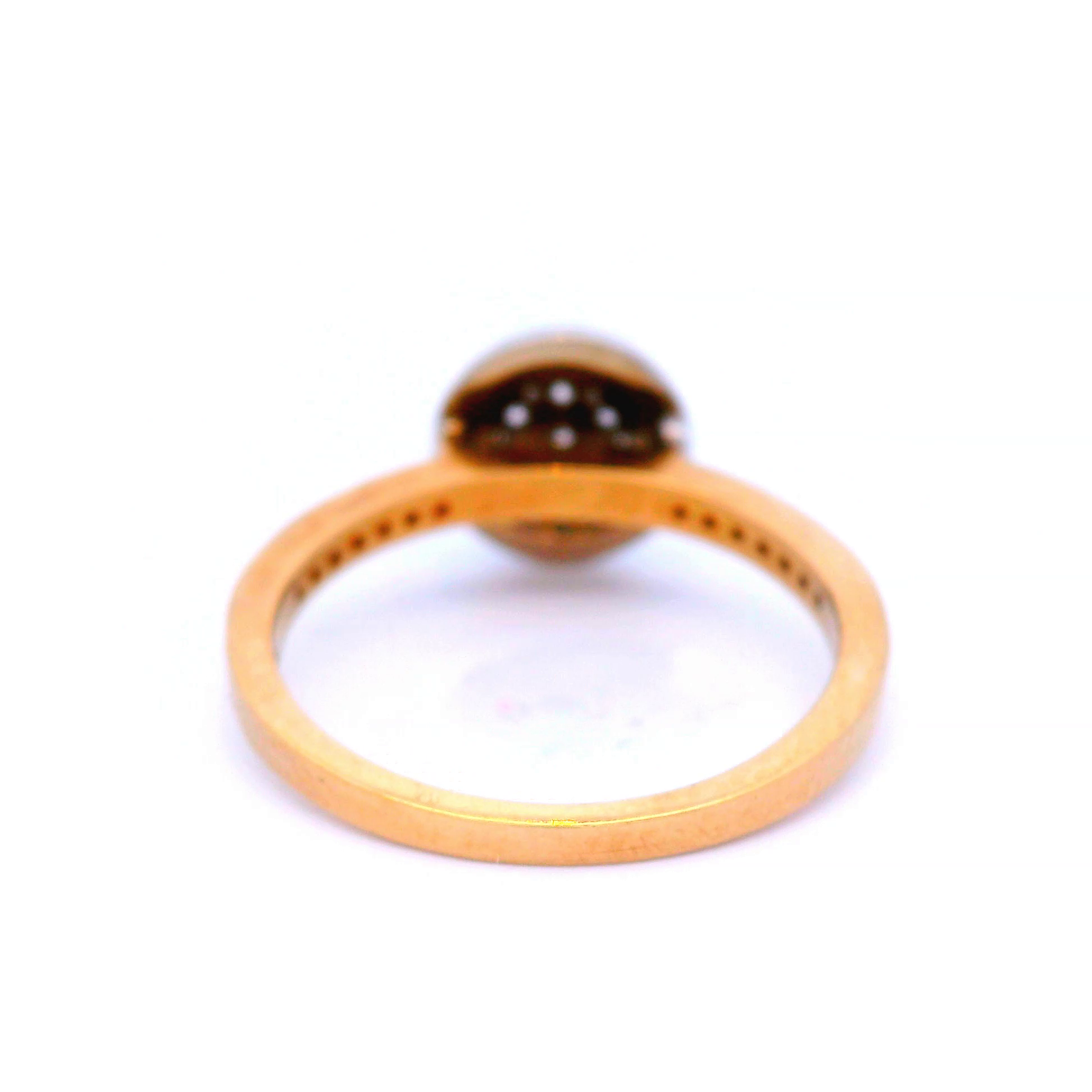 Halo Set Diamond Ring in a Two Tone Gold