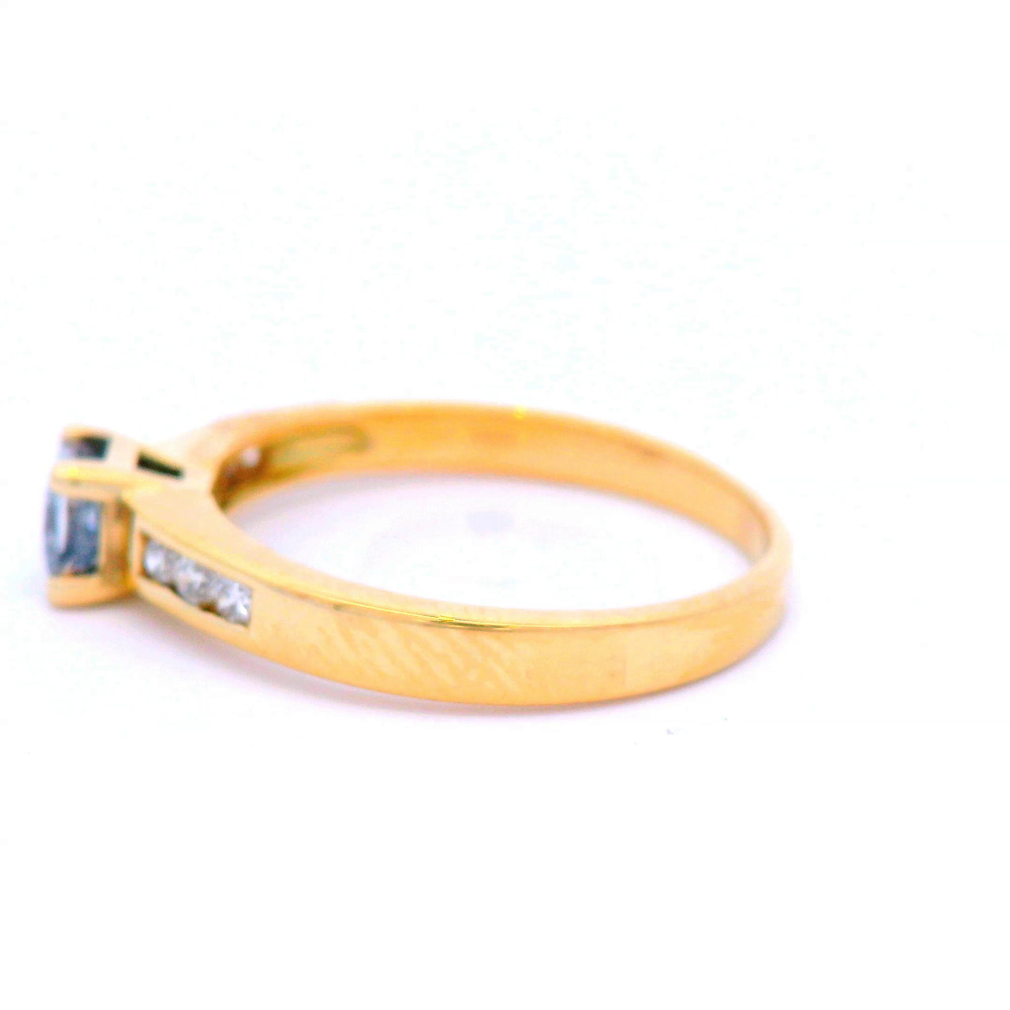 Princess Cut Diamond in Yellow Gold with Channel Set Shoulders