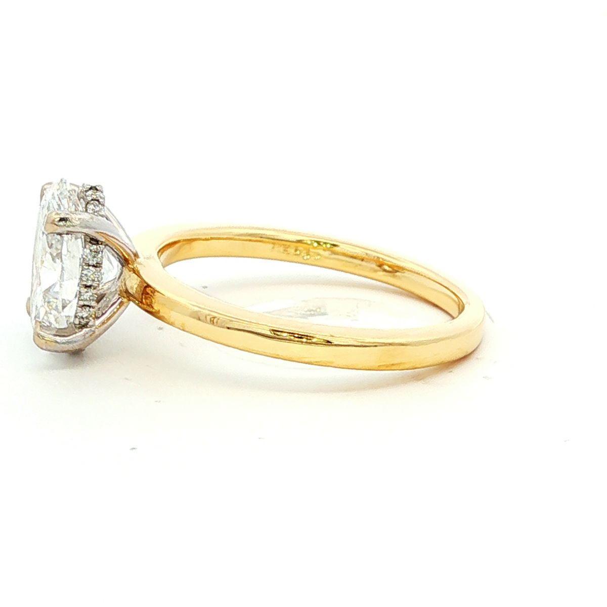Oval Diamond Solitaire Ring in Yellow Gold