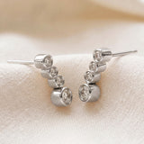 Sterling Silver Graduating Bezel Set White CZ Studs
