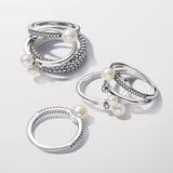 Sterling silver ring with white treated freshwater cultured pearl and clear cubic zirconia