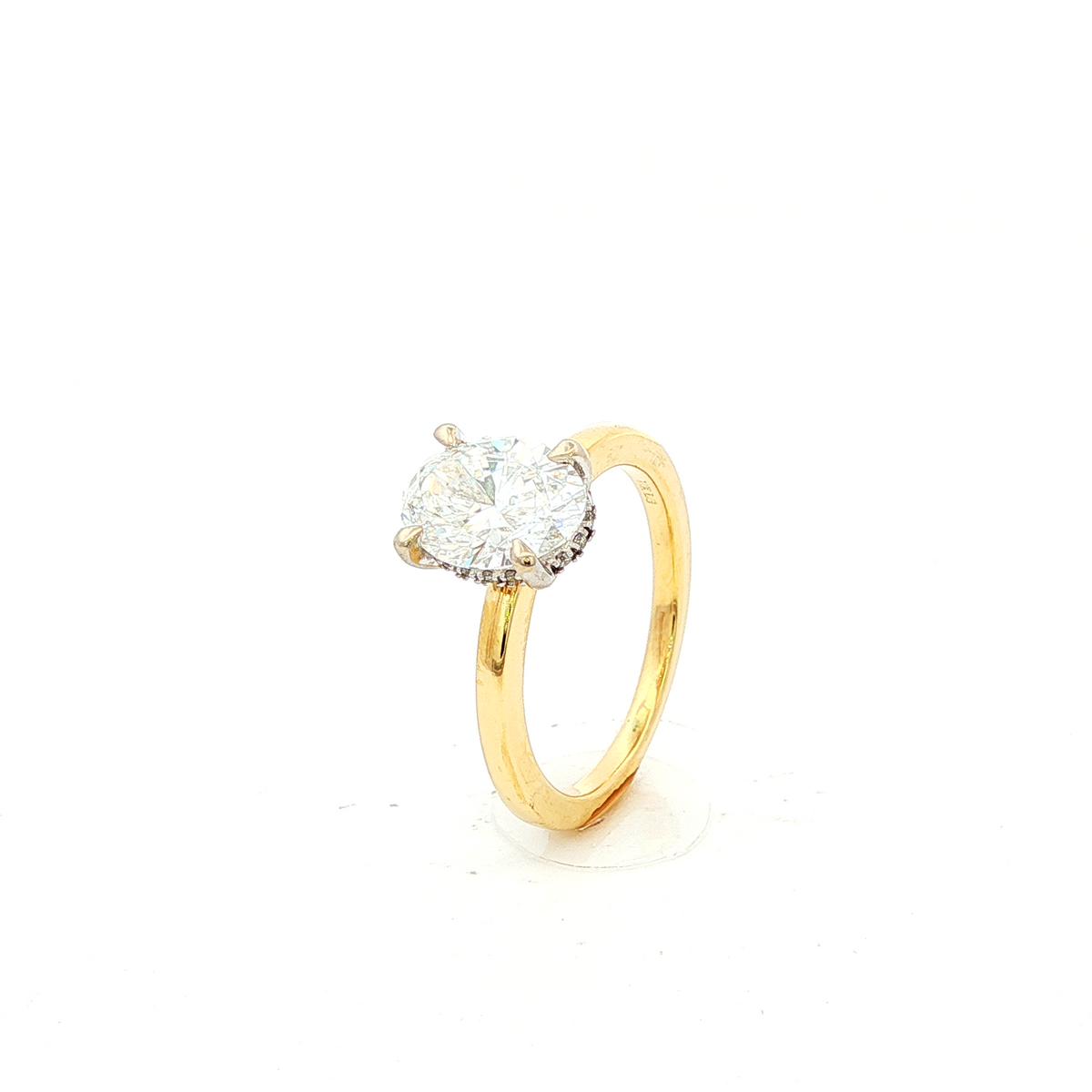 Oval Diamond Solitaire Ring in Yellow Gold