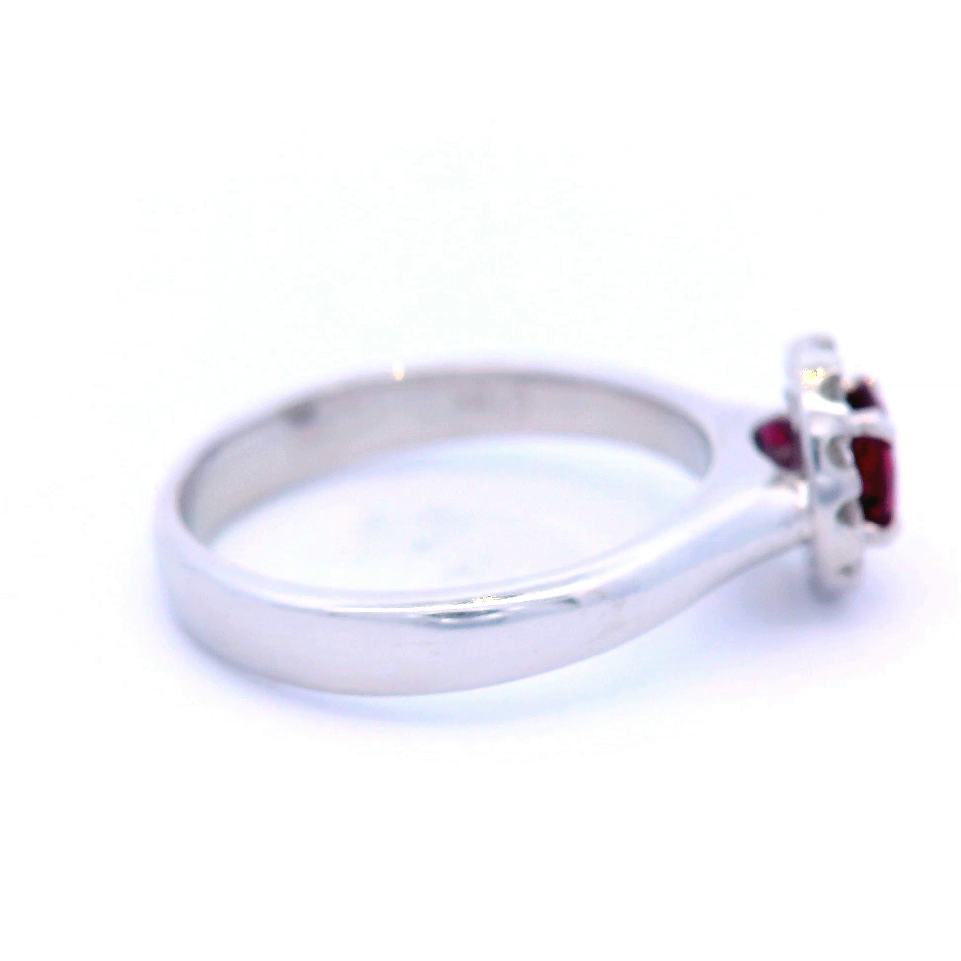 Natural Oval Ruby in White Gold with Round Brilliant Cut Halo Diamond