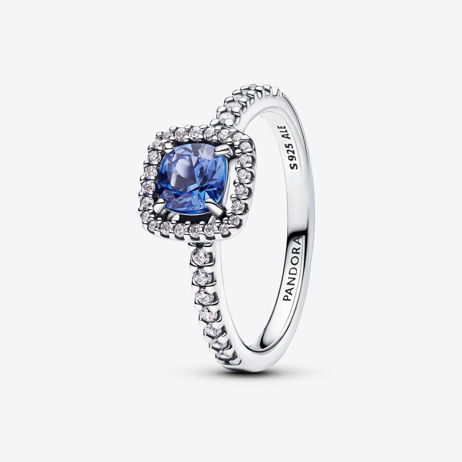 Sterling silver ring with cornflower blue crystal and clear cubic zirconia