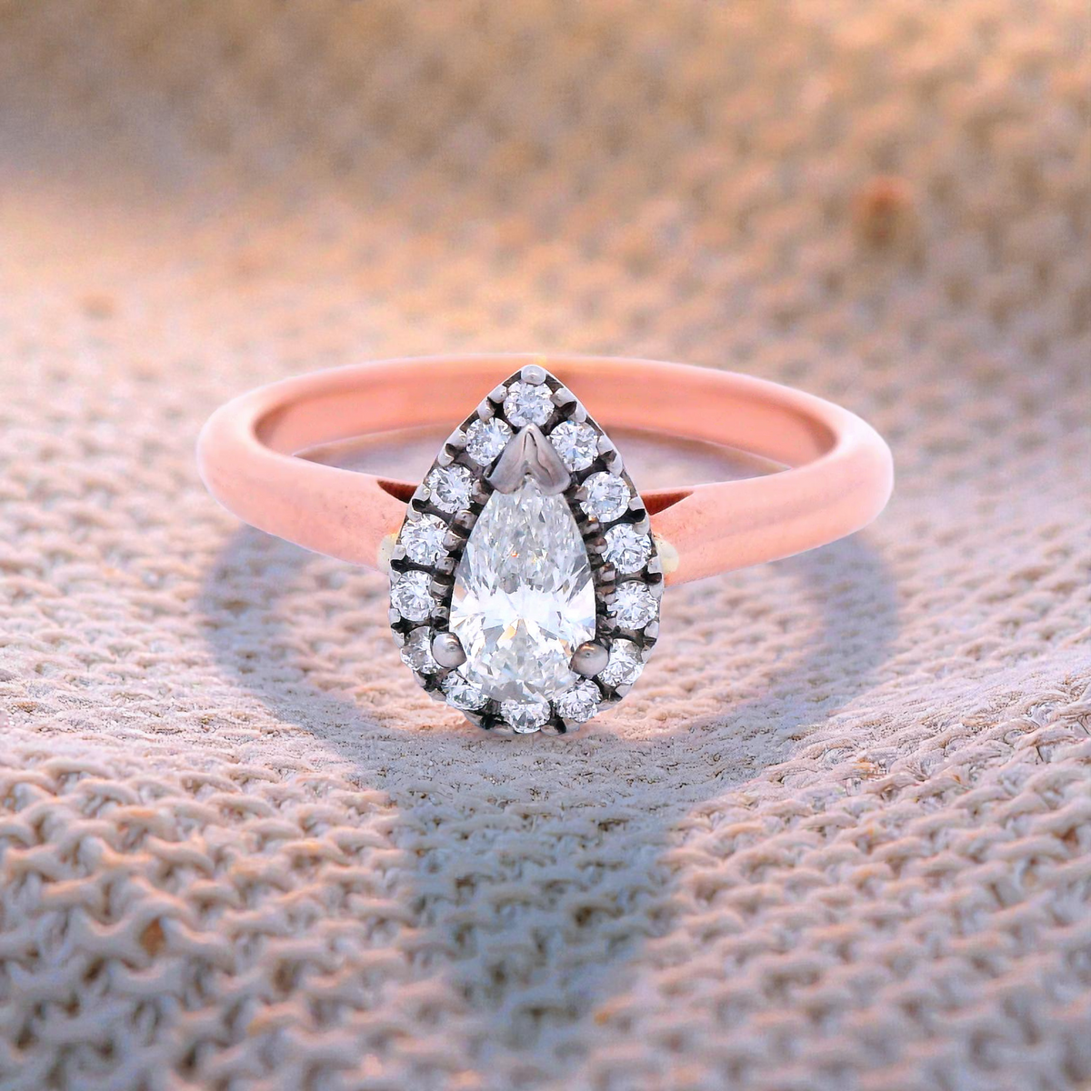 Halo Set Pear Shaped Diamond Engagement Ring set in Rose Gold