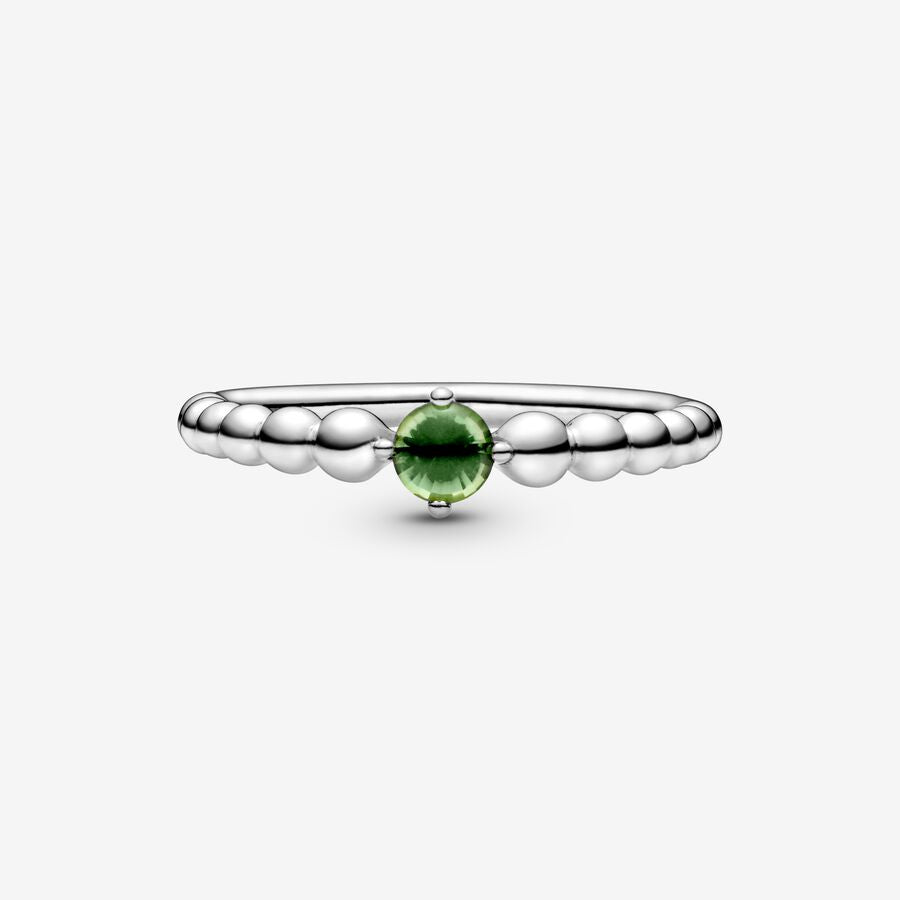 Sterling silver ring with treated spring green topaz