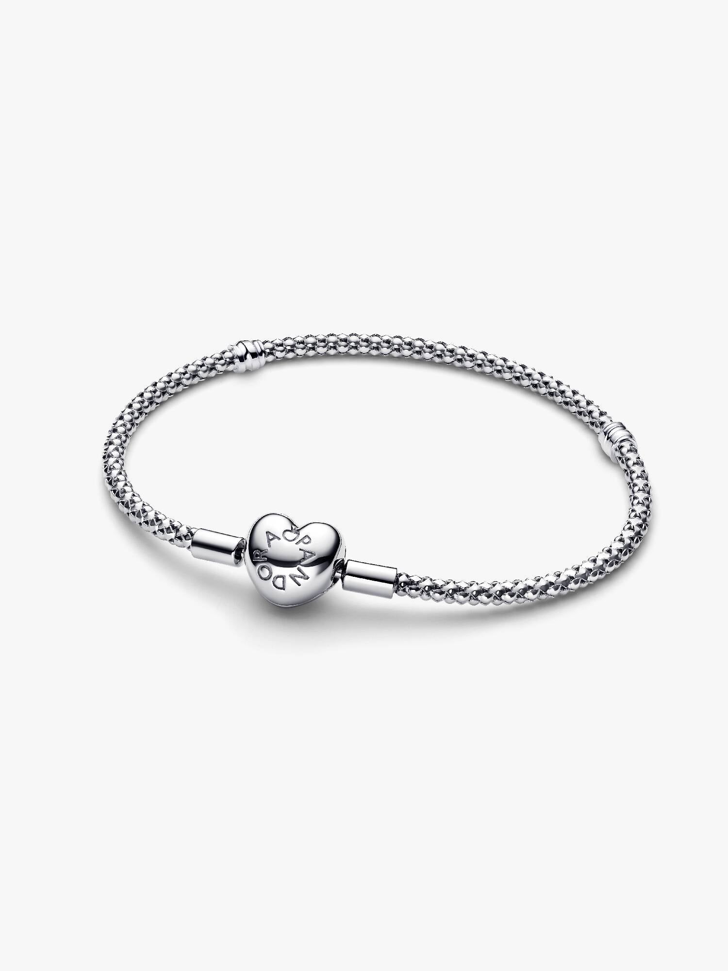 Sterling silver studded chain bracelet with heart clasp