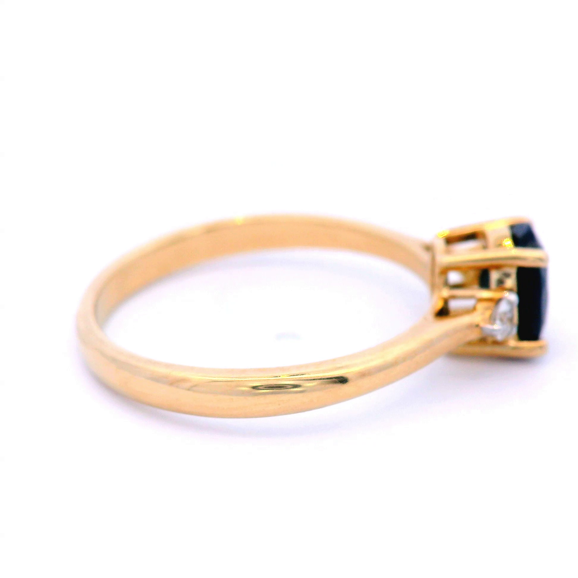 Oval Cut Black Sapphire in Yellow Gold Dress Ring