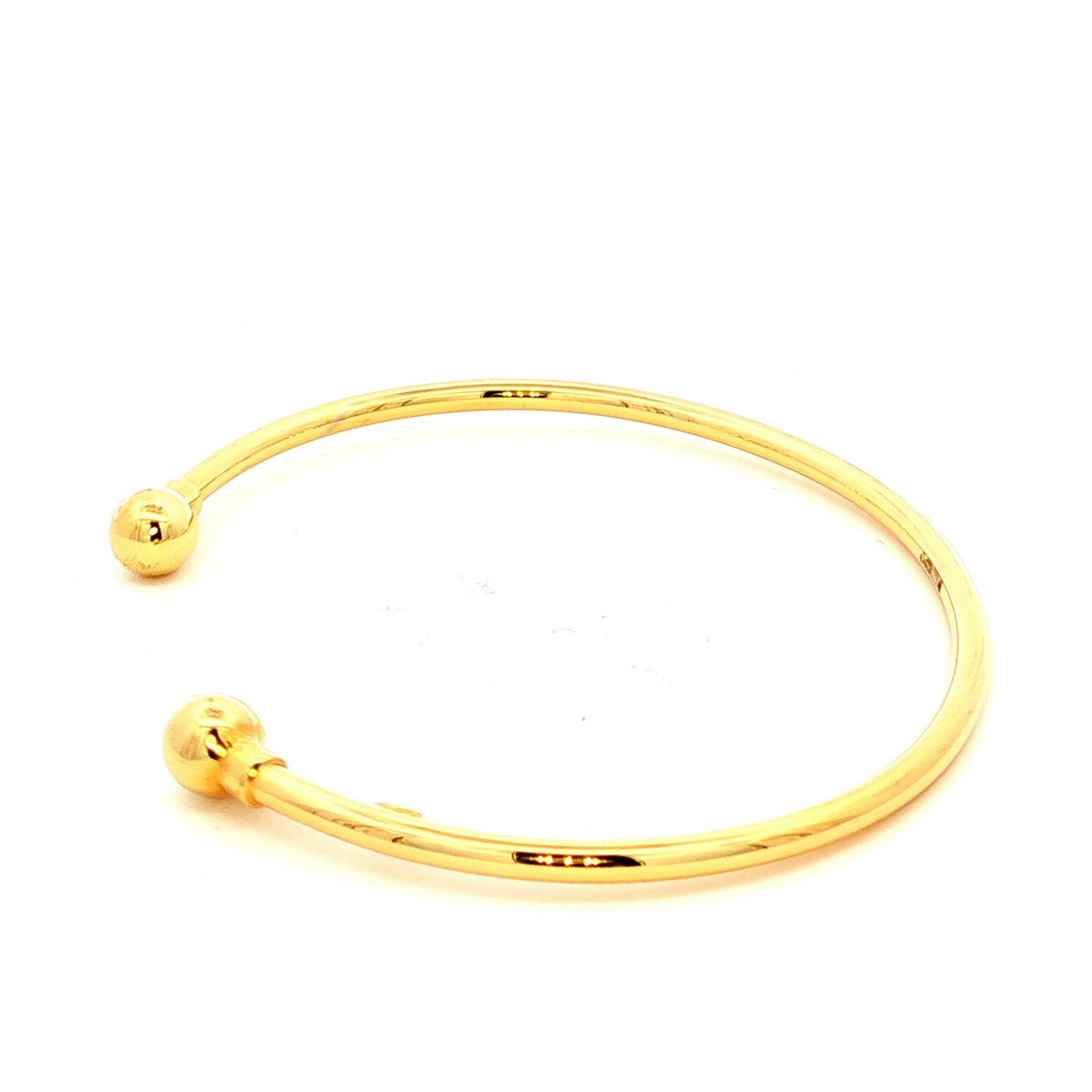 Hollow Ball End Cuff Bangle in Yellow Gold