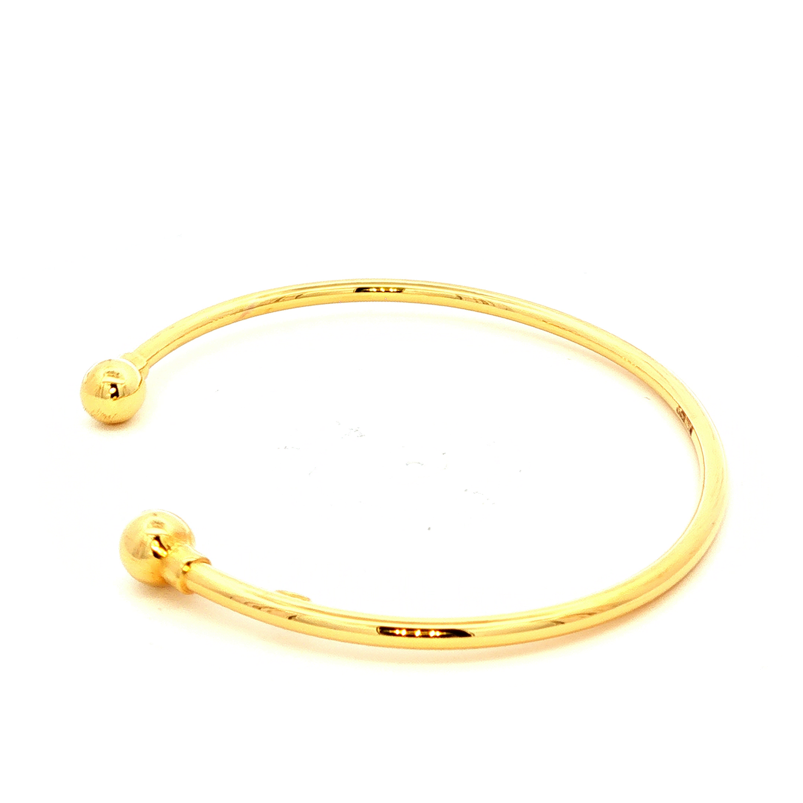 Hollow Ball End Cuff Bangle in Yellow Gold