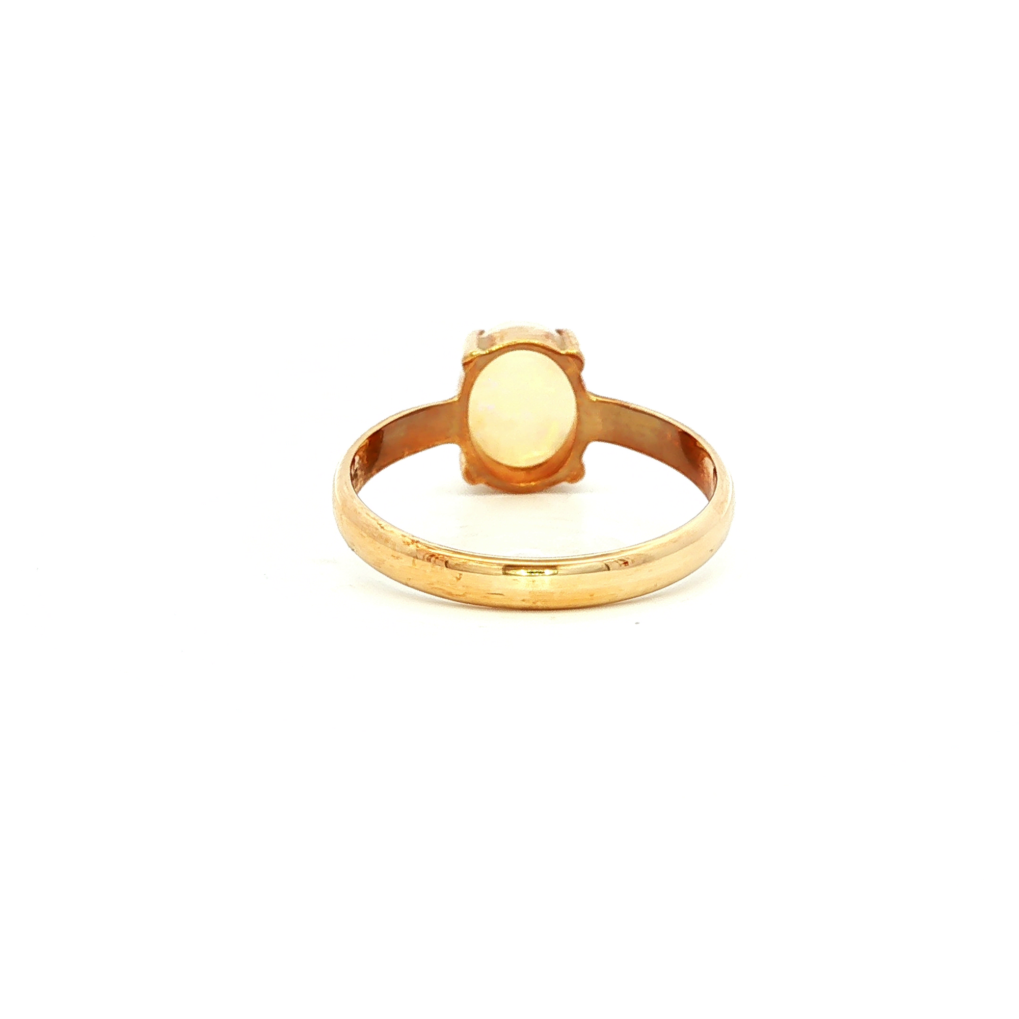 Solid Oval White Opal Ring in Yellow Gold