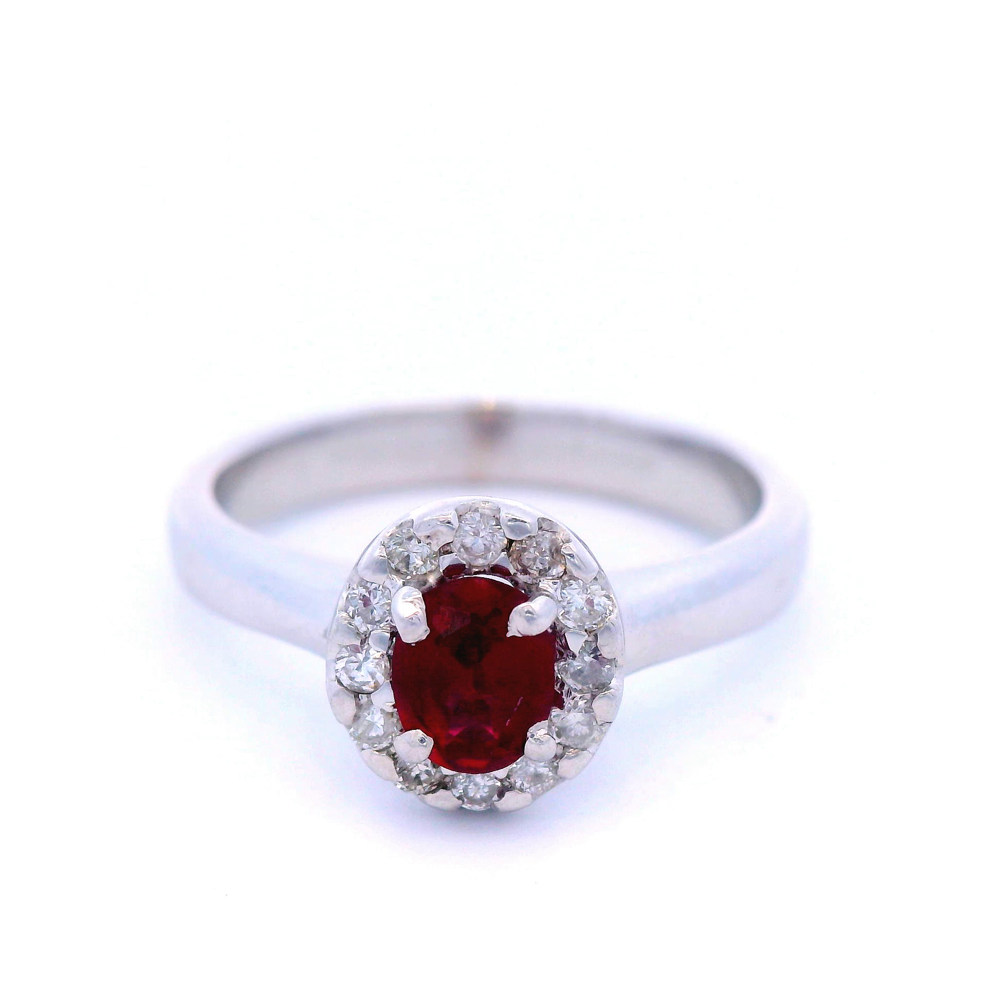 Natural Oval Ruby in White Gold with Round Brilliant Cut Halo Diamond