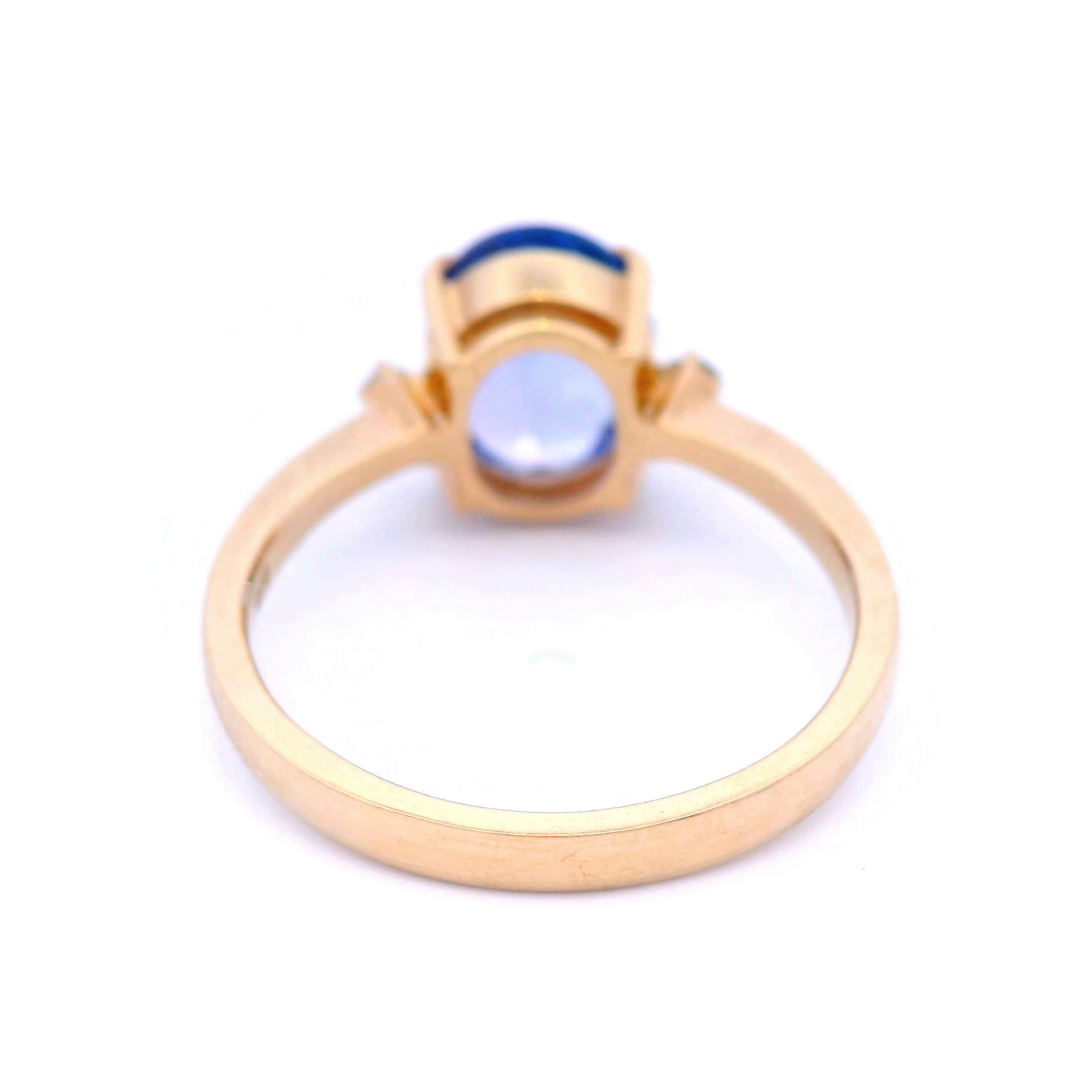 Natural Oval Tanzanite with Diamond Dress Ring in Yellow Gold