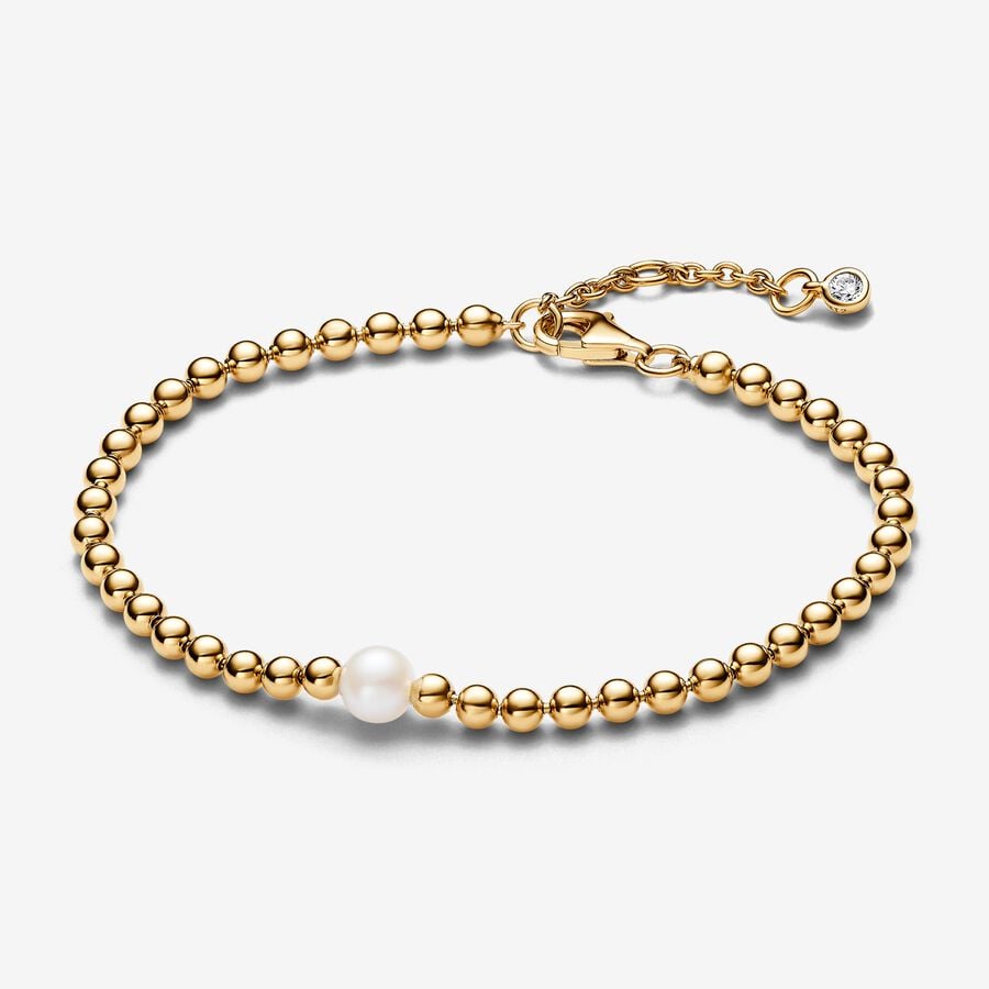 Beaded 14k gold-plated bracelet with white treated freshwater cultured pearl and clear cubic zirconia