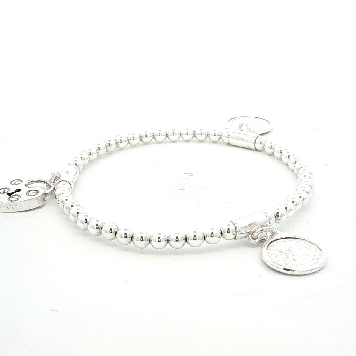 Sterling Silver Stretchy Ball Bracelet with Triple Tiny Tokens