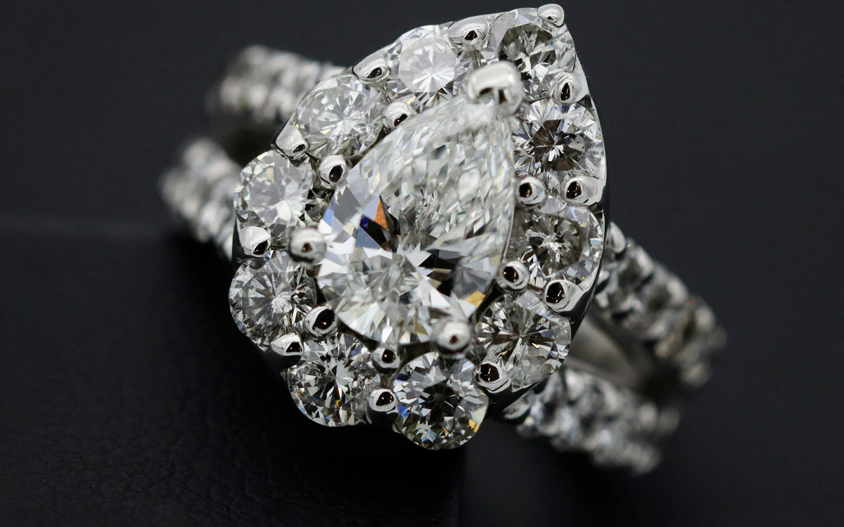Engagement ring on dark velvet