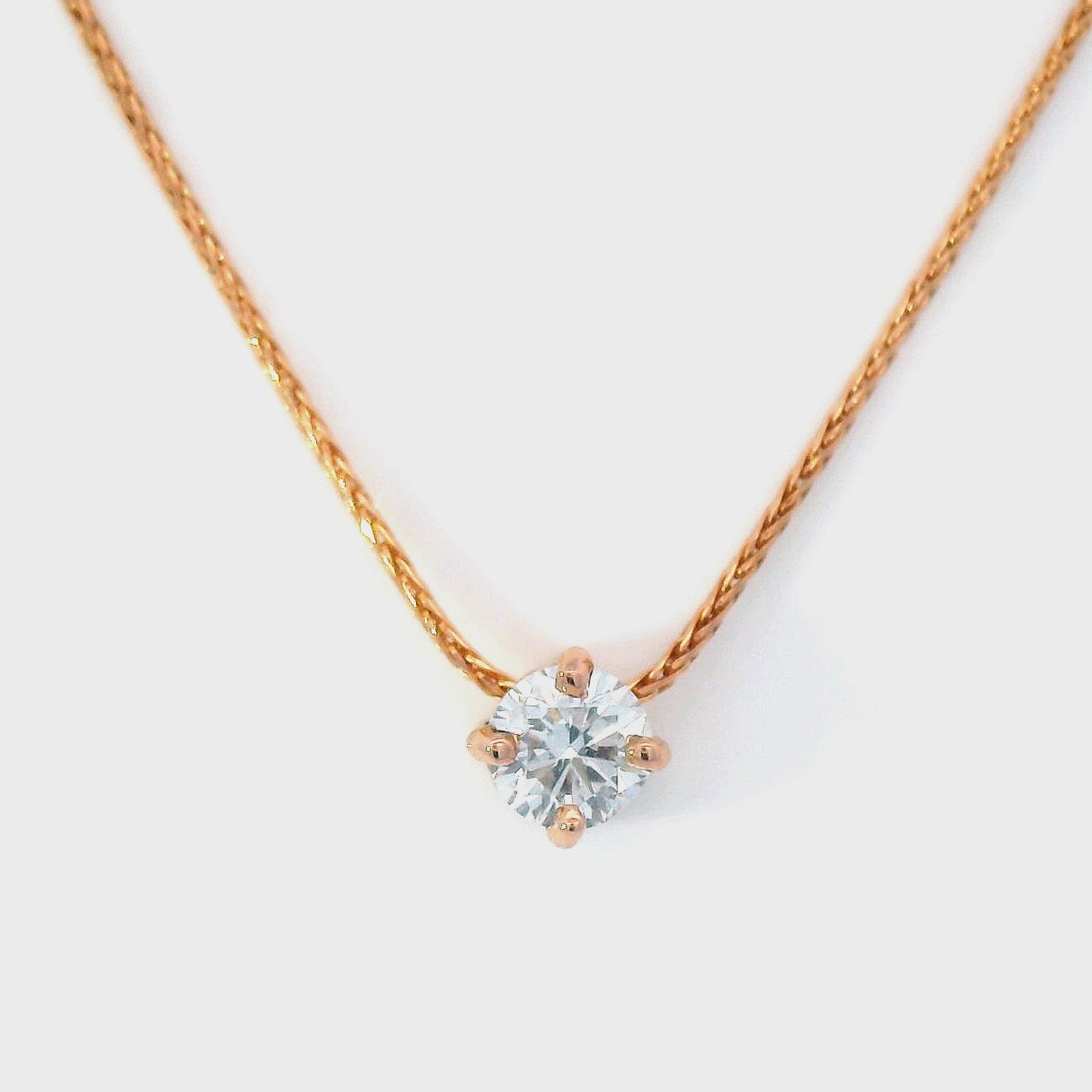 Diamond Slider Pendant on Rose Gold Wheat Chain.