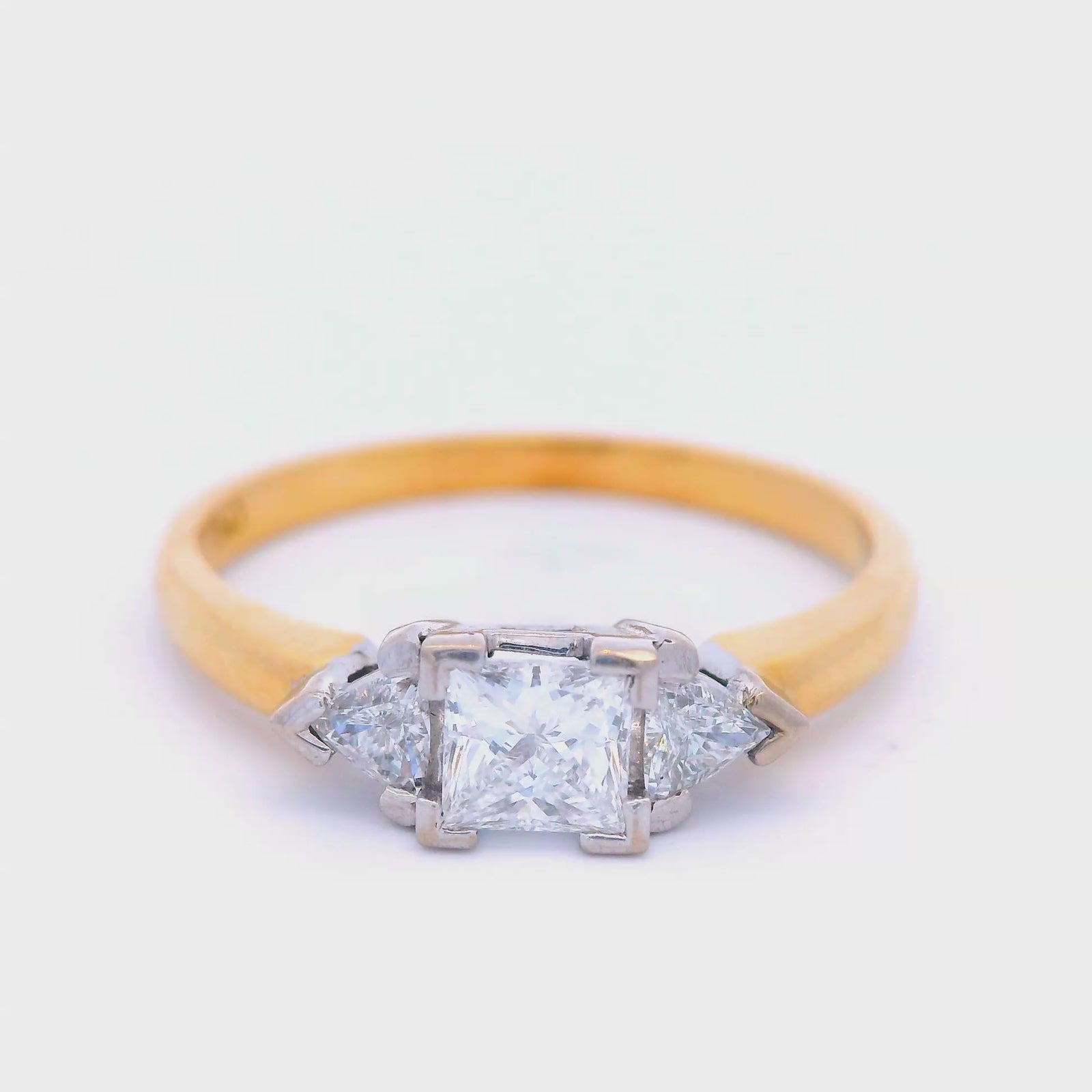 Trilogy Princess Cut and Trilliant Diamond Engagement Ring in Yellow Gold