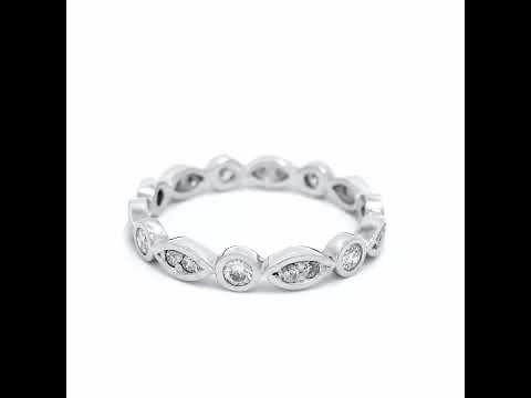 PLATINUM & DIA BEZEL SET RING. PATTERN ALL WAY AROUND RING SZ M