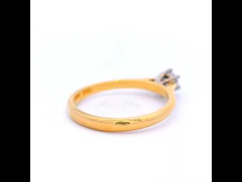 Round Brilliant Cut Diamond Ring Set in Yellow Gold