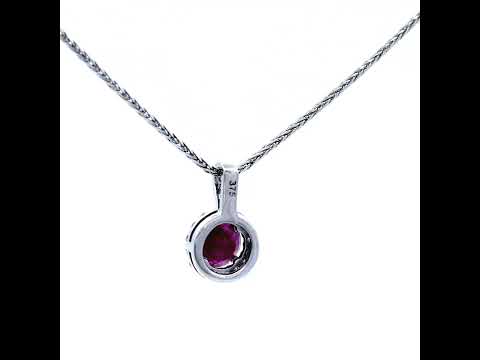 Round Ruby Stone Set in White Gold