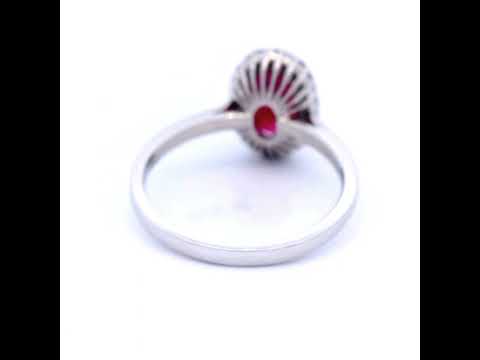 Oval Ruby Set in White Gold Dress Ring