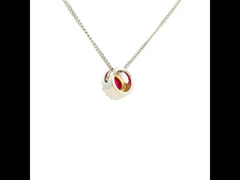 Ruby and Diamond Halo Pendant in White Gold
