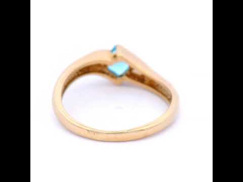 Blue Topaz Semi Rubbed Set in Yellow Gold