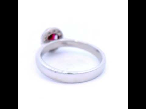 Natural Oval Ruby in White Gold with Round Brilliant Cut Halo Diamond