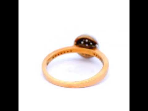 Halo Set Diamond Ring in a Two Tone Gold