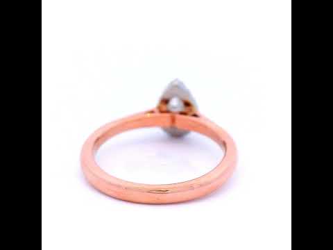 Halo Set Pear Shaped Diamond Engagement Ring set in Rose Gold