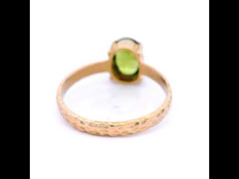 Oval Peridot in a 4 Claw Setting and Hammered Detail Band